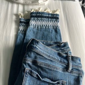 Loft skinny jeans with tassles and stitching on bottoms